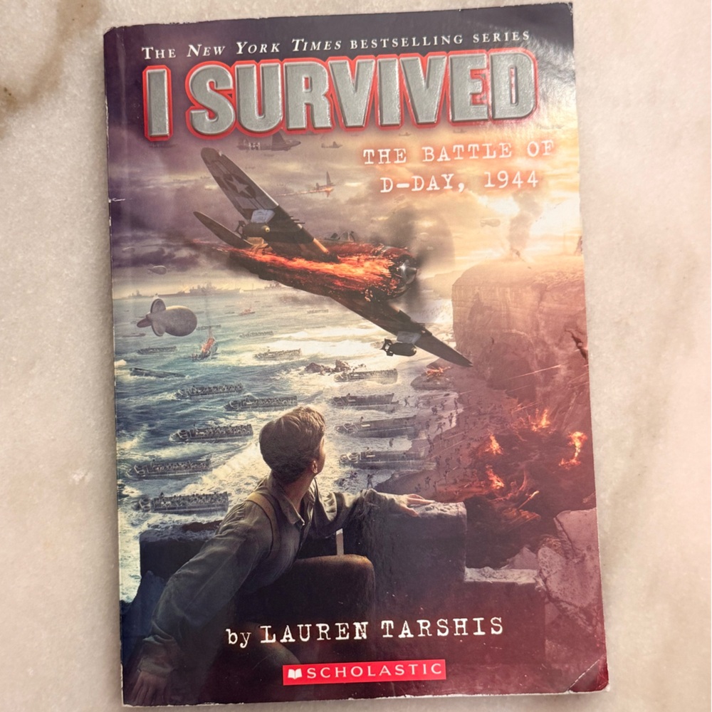 Scholastic I Survived Book with Red and Blue Cover